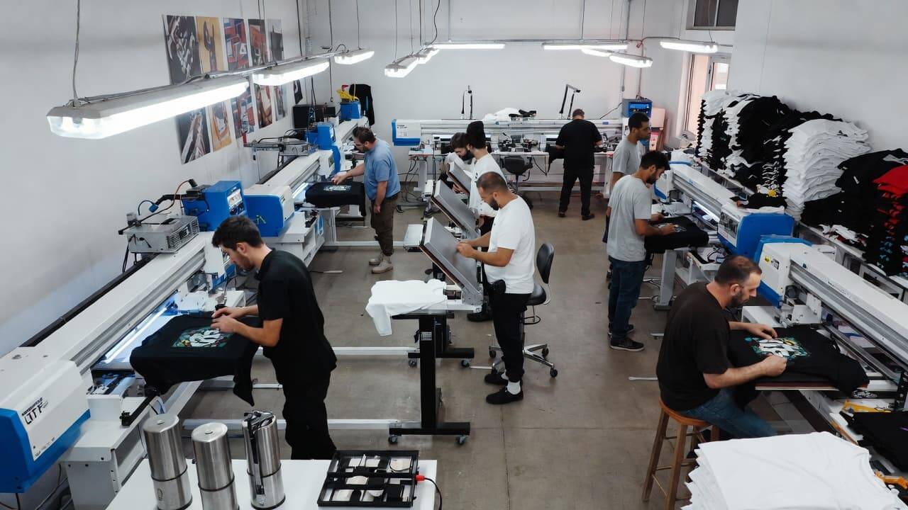 Small apparel business using DTF printers for custom t-shirt production