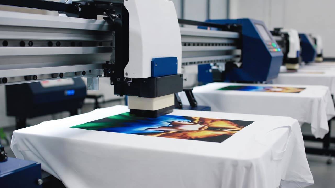 DTG printer printing a high resolution colorful design on a cotton T shirt