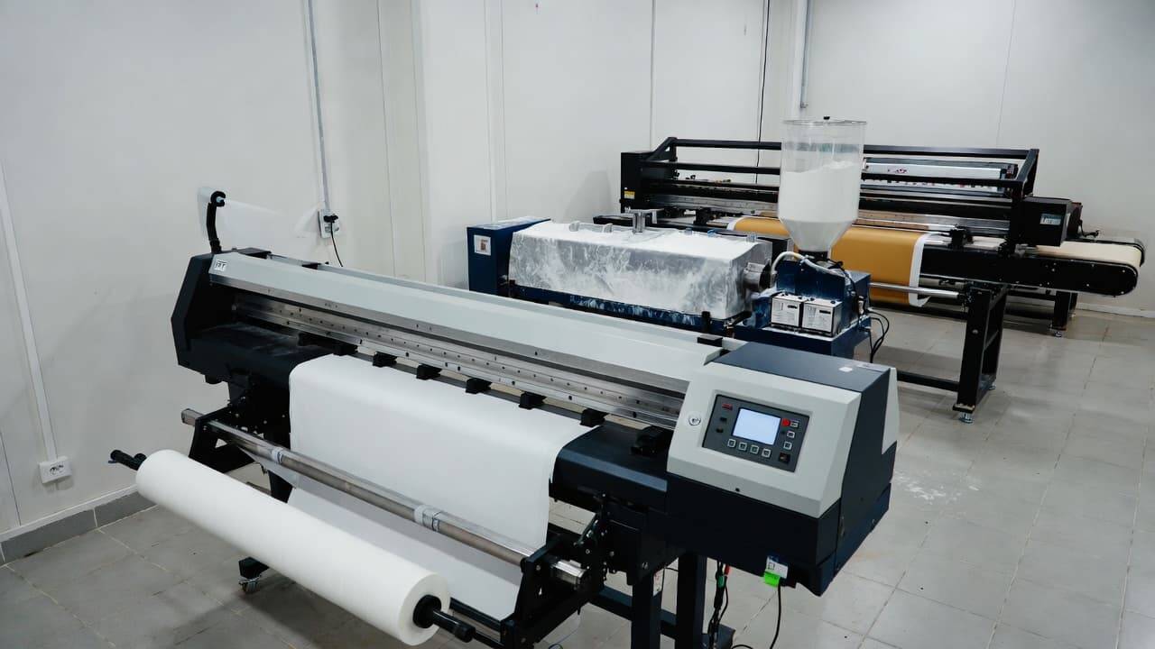 Complete DTF printer setup with powder shaker and dryer for textile printing